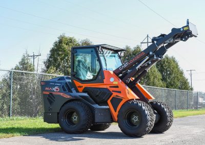 Cast Loaders Maxo represents today the flagship model of our production. It is produced in two water-cooled versions of 57HP diesel engines which differ in the speed system. A very powerful and robust machine, suitable for multiple applications, above all in agriculture and construction. All models can be supplied with heated cabin and air conditioning. The 11-Function joystick is standard for all Maxo Models and is available in an ergonomic version as an option. MAXO is one of the largest articulated loaders available in the market. Featuring a 57 Hp Kohler KDI 1903TCR / Stage V compliant engine with an option for Single or Twin Speed models. The MAXOs 4,630 LB Lifting Capacity is the attention grabber of this machine!